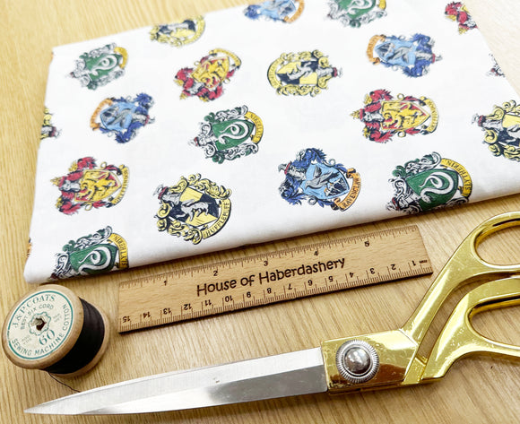 FABRIC REMNANT - Harry Potter Hogwarts House Badges Cotton Fabric - 1m Length