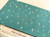Christmas Fabric - Gold Glitter Stars on Green - Cotton Fabric