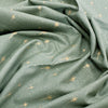 Christmas Fabric - Gold Glitter Stars on Green - Cotton Fabric