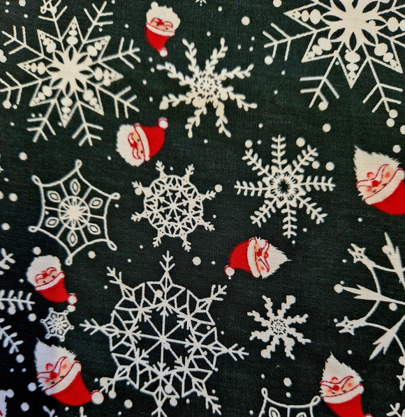 Christmas Fabric - Father Christmas & White Snowflakes on Black - Polycotton Prints