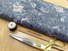 Nutex Fabric - Dinosaur Fossils on Slate Grey Blue