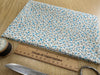 Cotton Fabric - Pretty Blue Ditsy Floral Print on Cream