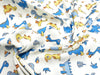 Cotton Fabric - Cute Blue Dinosaurs on Ivory - Quilting Craft Fabric Material