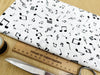 Cotton Fabric - Black Music Notes on Ivory - Quilting Craft Fabric Material