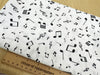 Cotton Fabric - Black Music Notes on Ivory - Quilting Craft Fabric Material