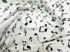 Cotton Fabric - Black Music Notes on Ivory - Quilting Craft Fabric Material
