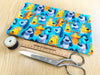 Cotton Fabric - Happy Dogs on Blue