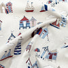 Canvas Fabric - Beach Huts Lighthouse Boats Seaside Print on CREAM - Craft Material