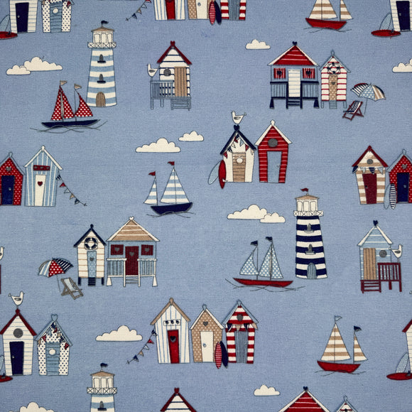 Canvas Fabric - Beach Huts Lighthouse Boats Seaside Print on Blue - Craft Material