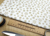 Christmas Fabric - Gold Snowflakes on Cream - Cotton Fabric