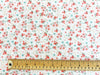 100% Cotton Poplin - Coral Pink Small Ditsy Floral on Cream